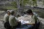 Frente al cenote Xlacah, estudiantes responden a las preguntas de su examen.